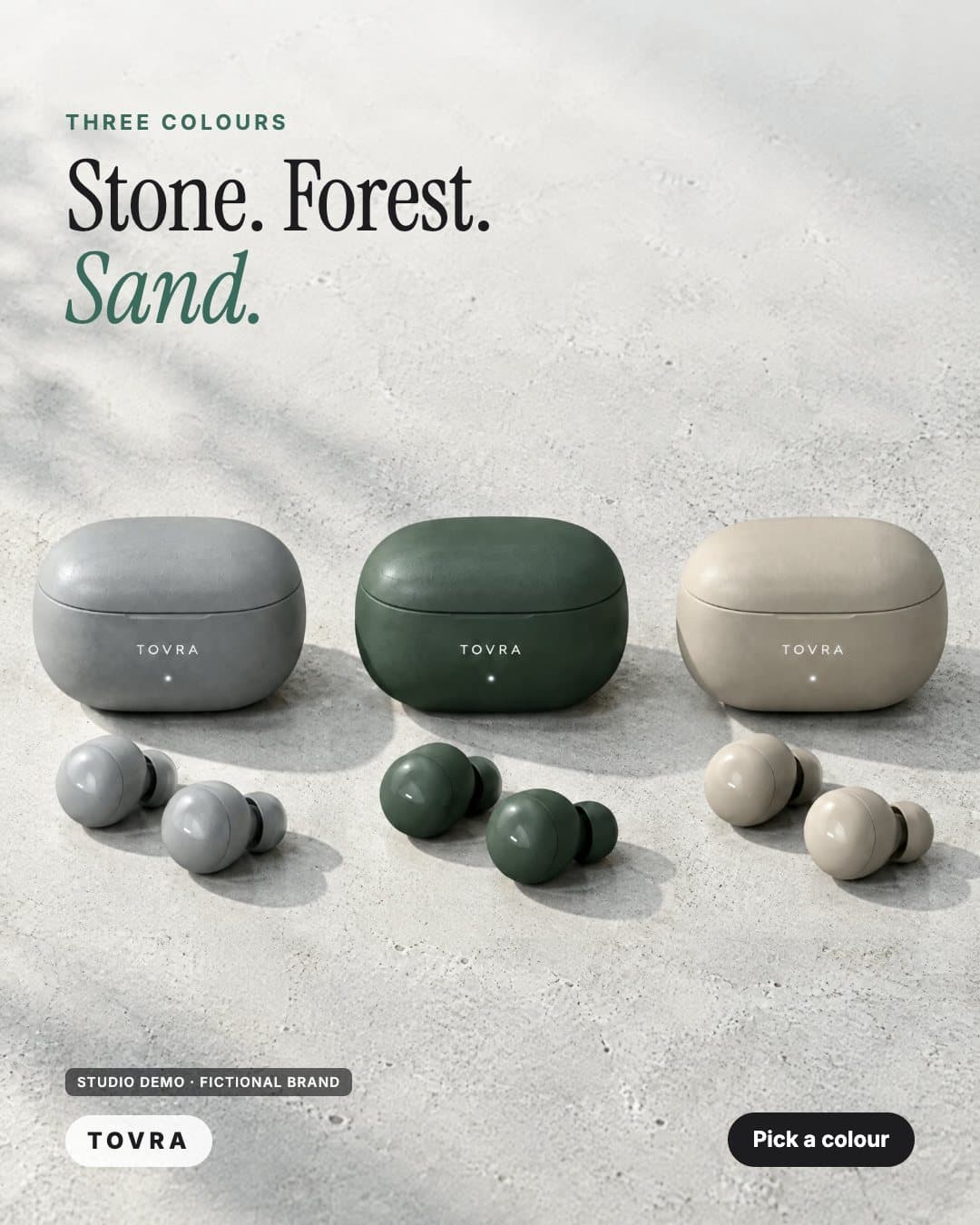 TOVRA ad: the earbud case in stone, forest and sand side by side, headline Stone. Forest. Sand. (studio demo, fictional brand)