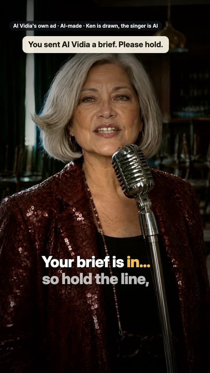 AI Vidia's own ad: an AI lounge singer performs hold music to an empty hotel lounge while a drawn Ken (Kenneth Dosanjh, Co-founder / Creative Director) reads the brief on a whiteboard and replies before the key change; the board then shows Day 0, Day 3 and Day 7 on monthly plans, and the end card shows the real Kenneth.