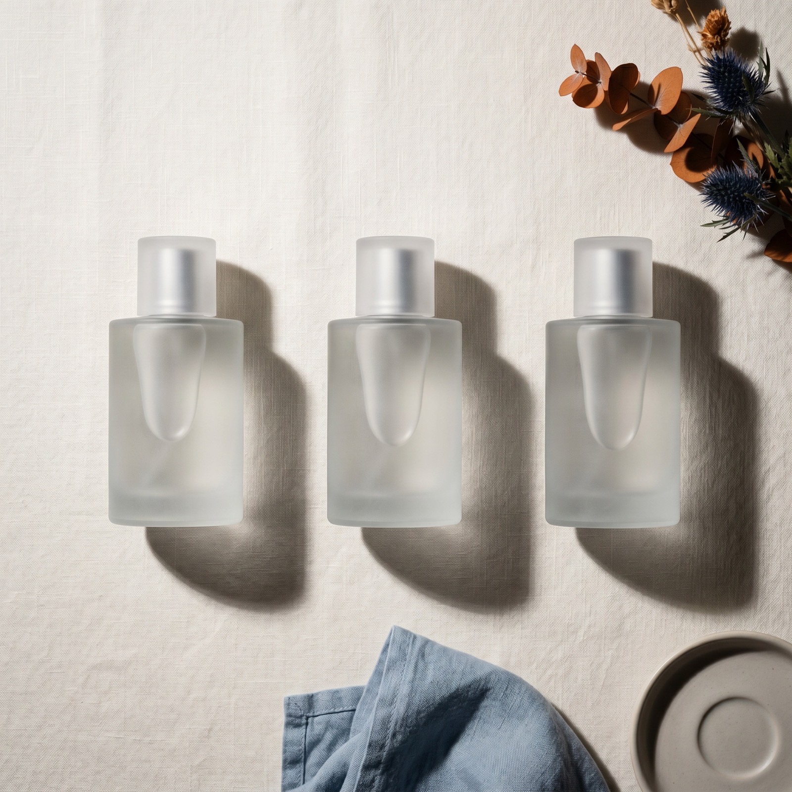 Overhead of a product continuity frame holding a consistent bottle across three positions.